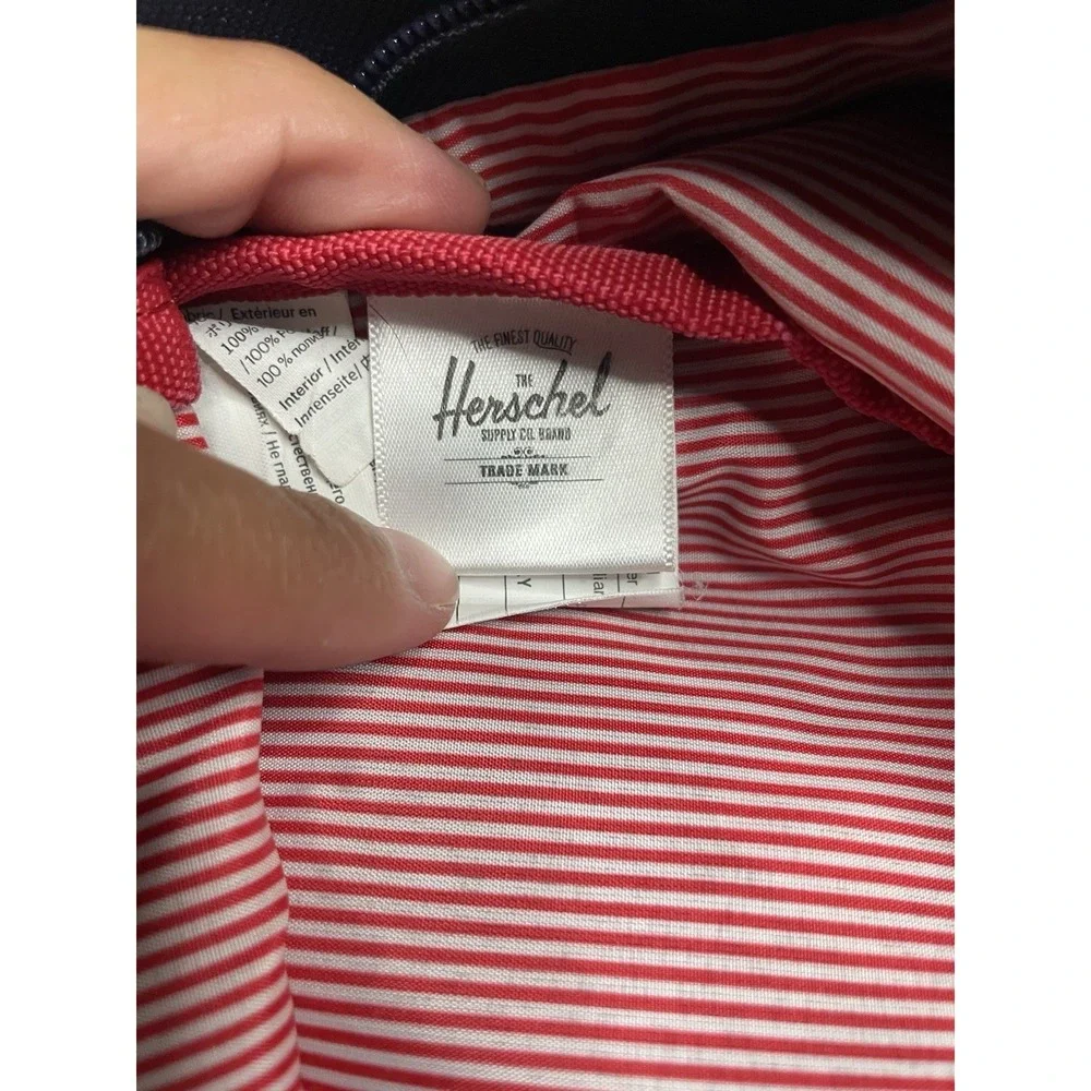 Herschel Navy Blue Backpack Zip Closure Red/White Striped Lining Pockets